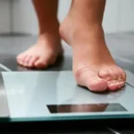 1800ss_getty_rf_stepping_onto_weight_scale